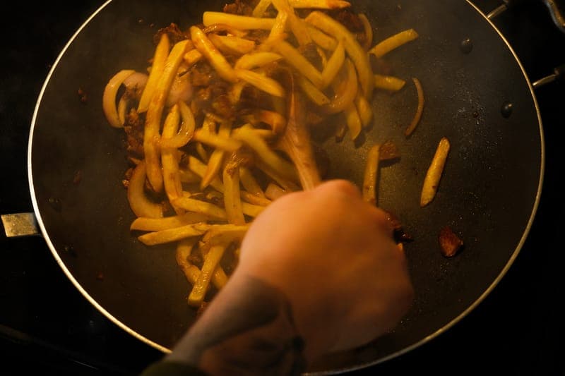 Stir-frying in wok