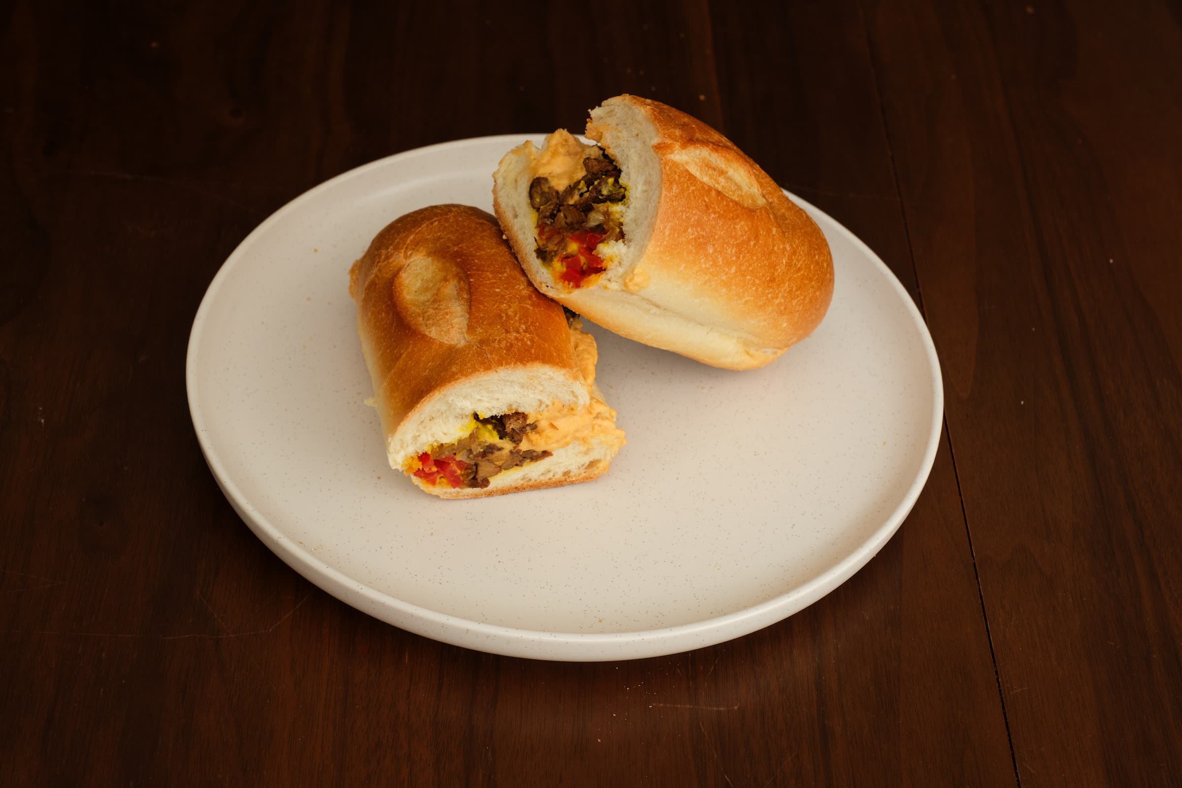 Cross-section of the vegan Philly cheesesteak showing the filling