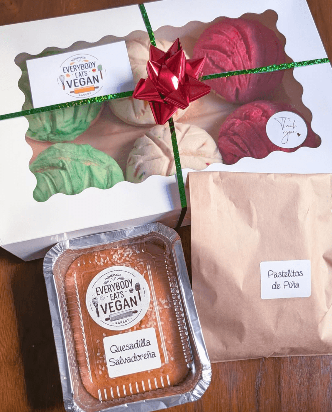 Holiday bakery box with quesadilla salvadoreña and pastelitos de piña